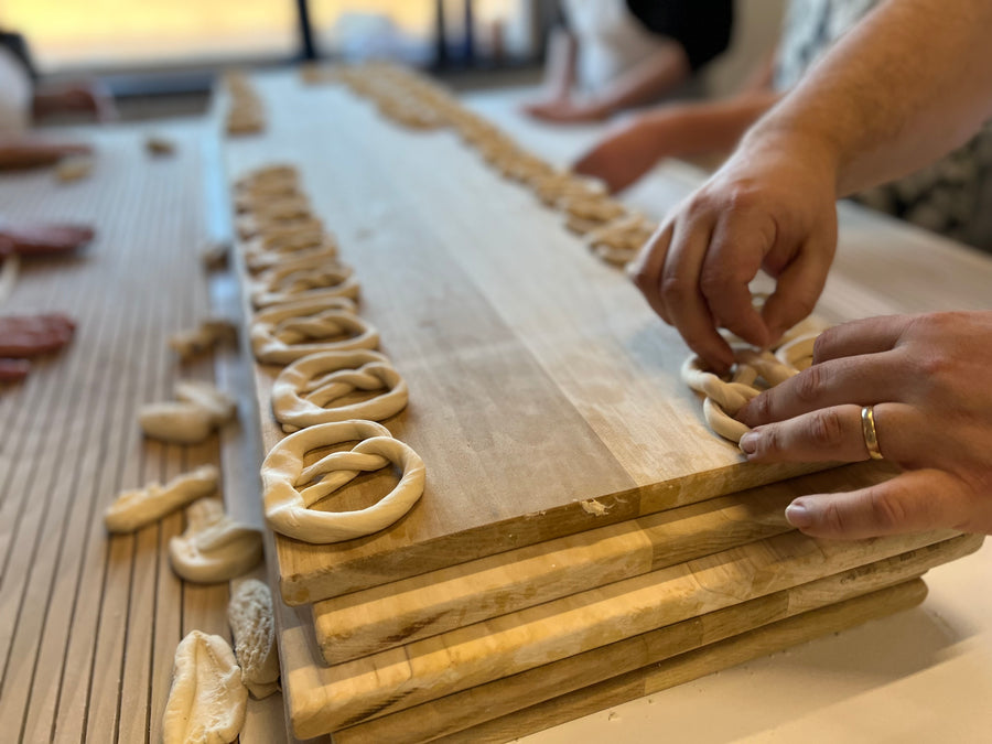 Hand-rolling and twisting pretzels